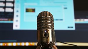 microphone in front of computer screen